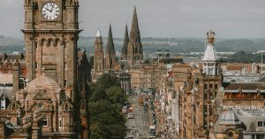 A large clock tower towering over a city